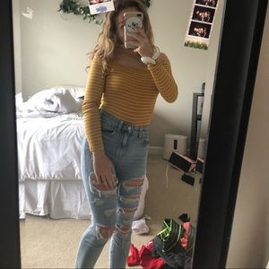yellow bodysuit